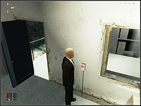 Stand in the spot shown on the screenshot above and wait for the guard to approach the coke machine and sneak into his room to hit the switch that turns of the lasers ahead - You Better Watch Out - Walkthrough - Hitman: Blood Money - Game Guide and Walkthrough