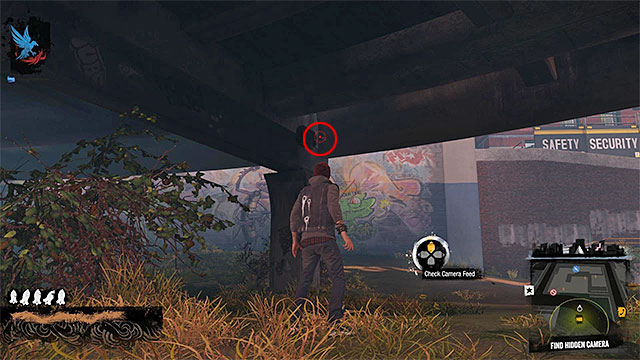 3) Hidden Camera - The camera you're looking for is located in the place shown on the above screen - Pioneer Square - more difficult activities - City - inFamous: Second Son - Game Guide and Walkthrough