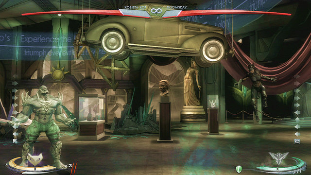 On the right side of the arena there's car hanging from the ceiling, you can jump up to interact with it - Metropolis - Arenas - Injustice: Gods Among Us - Game Guide and Walkthrough
