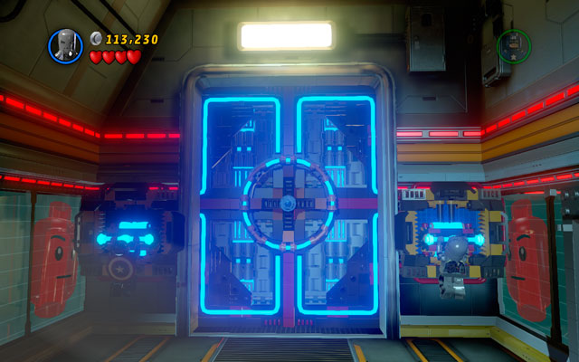 When the door is open, run towards the corridor and cover yourself with a shield - you will be targeted by another cannon - Rebooted, Resuited - Walkthrough - LEGO Marvel Super Heroes - Game Guide and Walkthrough