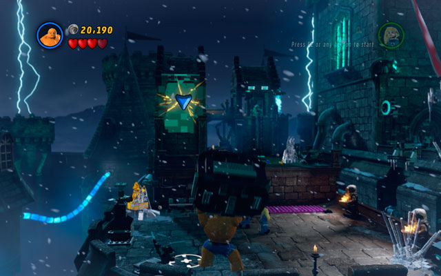 Land at the one of the castle towers, then fight the enemies crowded nearby - Doctor in the House - Walkthrough - LEGO Marvel Super Heroes - Game Guide and Walkthrough