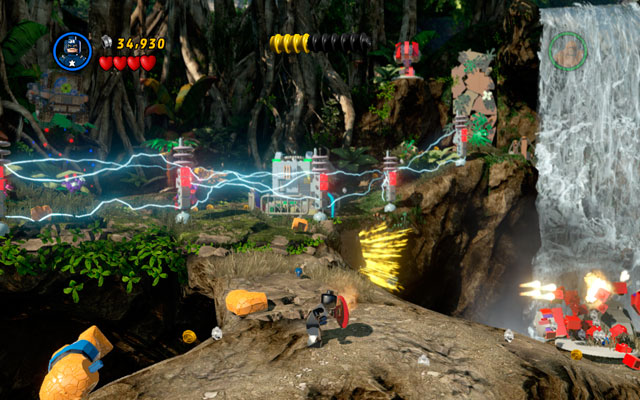 Switch into the Thing and approach to the wall on the right, destroying all bushes and the wall itself - Rapturous Rise - Walkthrough - LEGO Marvel Super Heroes - Game Guide and Walkthrough