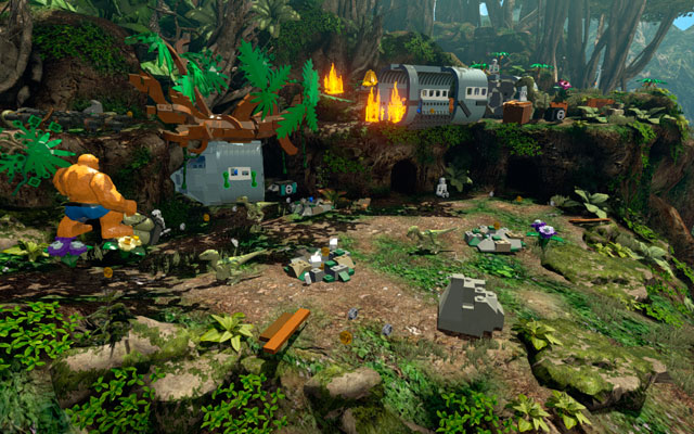 Head to the right, looking for the fallen tree - clean it from the bushes, uncovering two handles in that way - Rapturous Rise - Walkthrough - LEGO Marvel Super Heroes - Game Guide and Walkthrough