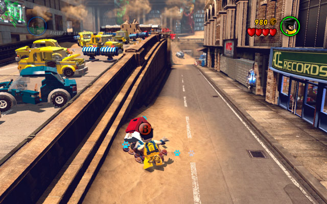 At the beginning of the stage jump down from the street and turn right, looking for the pizza motorcycle - dig it up with Wolverine - Sand Central Station - Minikit Sets - LEGO Marvel Super Heroes - Game Guide and Walkthrough