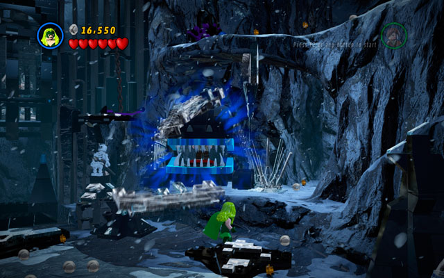 To rescue Stan Lee, choose Magneto or Polaris and - with their special powers - open the metal jaws placed on the right side of the gate - Deadpool Bonus Missions - Stan Lee in Peril - LEGO Marvel Super Heroes - Game Guide and Walkthrough