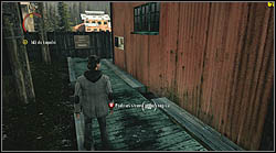 Another sheet lies on the ground, next to a red building at the coal mine - Manuscript - Episode 3: Ransom - Manuscript - Alan Wake - Game Guide and Walkthrough