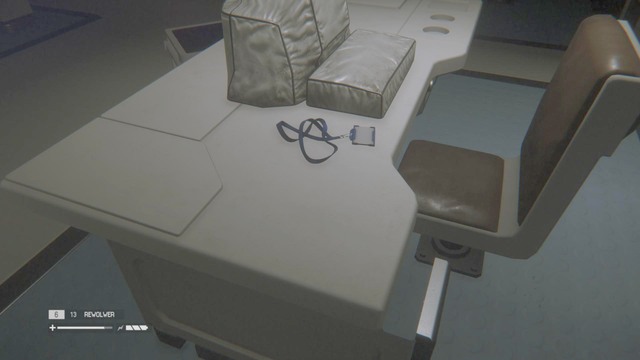 An ID Tag lies on a desk next to the door - Seegson Synthetics - Missing persons and Archive Logs - Alien: Isolation - Game Guide and Walkthrough