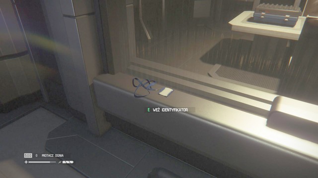 An ID Tag lies next to the two-way mirror in the interrogation room in Solomons Habitation Tower - Solomons Habitation Tower - Missing persons and Archive Logs - Alien: Isolation - Game Guide and Walkthrough