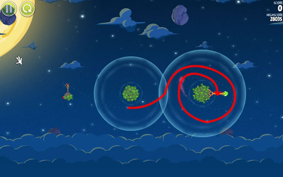 This way, the trajectory of the flight should look more or less like the one on the above screen - the bird makes one full circle and knocks the pig down at the next approach - Level 1-5 - Pig Bang - Angry Birds Space - Game Guide and Walkthrough
