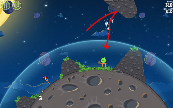 The bird will bounce off of the rock and hit the bubble with the pig, which will freeze and break into pieces - Level 1-6 - Pig Bang - Angry Birds Space - Game Guide and Walkthrough