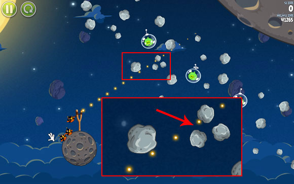 The first solution is to launch the bird between the three smaller asteroids shown on the screen - Level 1-15 - Pig Bang - Angry Birds Space - Game Guide and Walkthrough