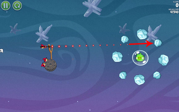 There is a frozen asteroid here; when you hit it, a chain reaction will occur and everything will be destroyed - Level 2-1 - Cold Cuts - Angry Birds Space - Game Guide and Walkthrough
