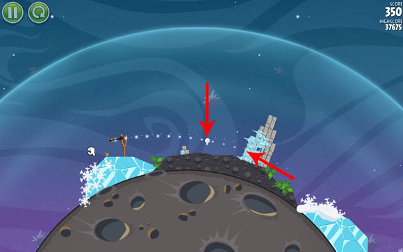 Zoom-out - launch the second bird at the indicated frozen block (the one right below the previous block) - Level 2-4 - Cold Cuts - Angry Birds Space - Game Guide and Walkthrough