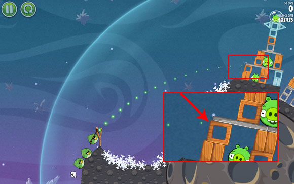 Launch the first bird by adjusting the flight path to go through the spot indicated on the above screen - this will collapse the first structure - Level 2-17 - Cold Cuts - Angry Birds Space - Game Guide and Walkthrough