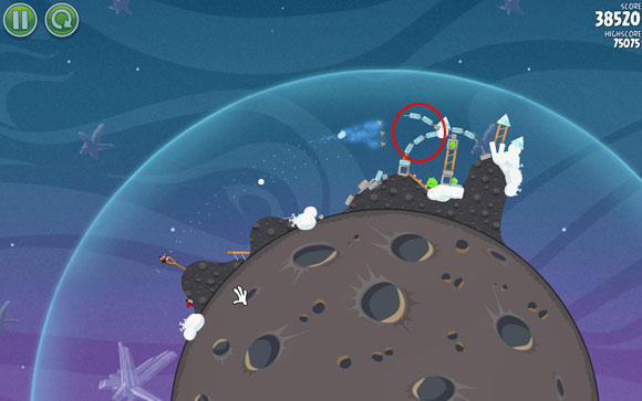 Launch the second bird at a slightly higher angle - your goal is to hit the ice shields, which, once destroyed, will unlock the way to the rest of the pigs - Level 2-14 - Cold Cuts - Angry Birds Space - Game Guide and Walkthrough