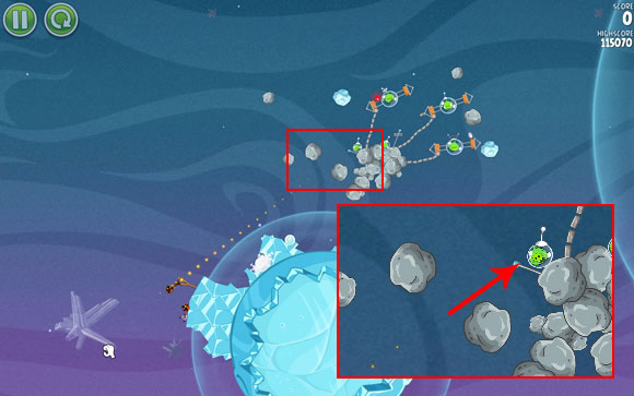 It may be difficult to adjust the flight path, but your target is the indicated pig - the line has to go just next to the meteorite right before it - Level 2-22 - Cold Cuts - Angry Birds Space - Game Guide and Walkthrough