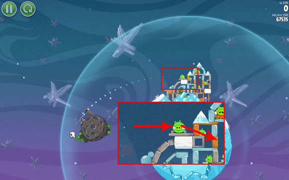 Launch the first bird in such a way that it hits the pig and flies inside the structure through the plank - Level 2-21 - Cold Cuts - Angry Birds Space - Game Guide and Walkthrough