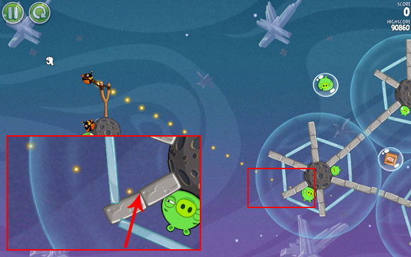 Launch the first bird at the closest planet - adjust the flight path so that the dots go through the line connecting the two blocks shown on the close-up - Level 2-29 - Cold Cuts - Angry Birds Space - Game Guide and Walkthrough
