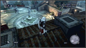 This feather is on the floor, south from the fountain [1] - Detailed Description - Feathers - Assassins Creed: Brotherhood - Game Guide and Walkthrough