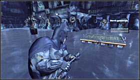 Prepare and shoot the Grapnel Gun towards the platform hanging above the water #1 - Rescue remaining undercover GCPD officers in the Museum - Main story - Batman: Arkham City - Game Guide and Walkthrough