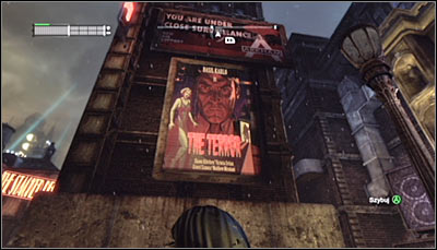 Find the large movie poster hanging from the wall (screen above) and scan it - Riddles - Park Row - Batman: Arkham City - Game Guide and Walkthrough