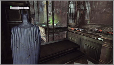 Examine the court's main room (the one in which Catwoman was held) and approach the small glass cabin (it was occupied by Two-Face; screen above) - Riddles - Park Row - Batman: Arkham City - Game Guide and Walkthrough