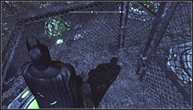 The solution to this puzzle isn't quite obvious, so try to directly follow the hints given here - Batman trophies (01-10) - Amusement Mile - Batman: Arkham City - Game Guide and Walkthrough