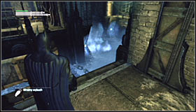 Approach the bridge which raises with the water level and turn right - Batman trophies (09-16) - Industrial District - Batman: Arkham City - Game Guide and Walkthrough