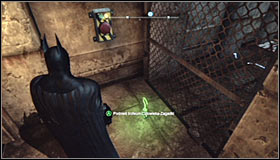 Equip the Line Launcher and shoot it at the wall behind the electrified floor #1 - Batman trophies (17-25) - Industrial District - Batman: Arkham City - Game Guide and Walkthrough