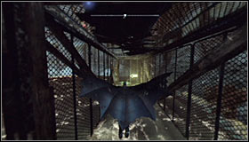 Jump off the ledge and after getting near enough to the cage, press the right trigger to activate the Dive Bomb #1 - Batman trophies (26-37) - Industrial District - Batman: Arkham City - Game Guide and Walkthrough