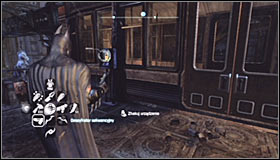 Find the stairs leading onto the upper platform of the monorail #1 - Batman trophies (22-30) - Bowery - Batman: Arkham City - Game Guide and Walkthrough