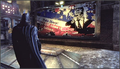 Find the campaign billboard (screen above) and scan it - Riddles - Bowery - Batman: Arkham City - Game Guide and Walkthrough