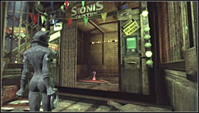 A locked gate guards access to the Trophy - Catwoman trophies - Steel Mill - Batman: Arkham City - Game Guide and Walkthrough