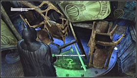 Afterwards perform a slide underneath the gate #1 - Batman trophies (11-23) - Museum - Batman: Arkham City - Game Guide and Walkthrough
