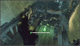 Stand east of the Trophy, look up and use the Grapnel Gun to reach the upper ledge #1 - Batman trophies (01-12) - Wonder City - Batman: Arkham City - Game Guide and Walkthrough