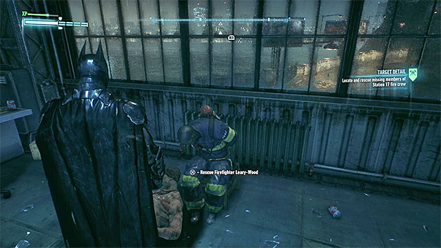 An example fireman - you can free him only after taking care of nearby bandits - The Line of Duty - Side missions (Most Wanted) - Batman: Arkham Knight - Game Guide and Walkthrough