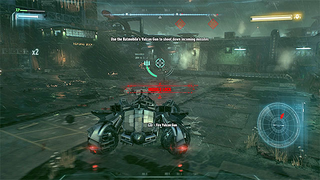 Use Vulcan Gun to destroy enemy missiles approaching you. - Arkham Knight - first encounter (flying drone) - Boss fights - Batman: Arkham Knight - Game Guide and Walkthrough