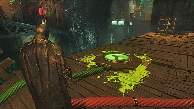 Turn right, use the blockade to extend the platform closer to you and park the batmobile there - Second Riddler trial - Riddlers Revenge - Batman: Arkham Knight - Game Guide and Walkthrough