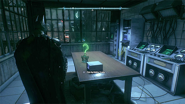 The trophy is lying on the table - Riddler trophies on Bleake Island (19-36) - Collectibles - Bleake Island - Batman: Arkham Knight - Game Guide and Walkthrough