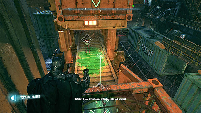 Send the robots under the container and then crush them by hitting the question mark with the batarang - Riddler trophies on Founders Island (17-33) - Collectibles - Founders Island - Batman: Arkham Knight - Game Guide and Walkthrough