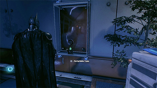 Break the glass and take the trophy - Riddler trophies in GCPD Lockup - Collectibles - GCPD Lockup - Batman: Arkham Knight - Game Guide and Walkthrough