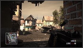 The radio station is located on the upper floor of a yellow building in the western part of the city - Acta Non Verba II - Campaign - Battlefield: Bad Company - Game Guide and Walkthrough