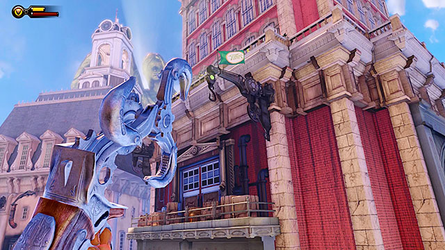 Proceed to a balcony located behind the restaurant and look up, centering the view on a red and white building hovering nearby - Go to the Monument Island and find the girl (part 1) - Chapter 4 - Comstock Center Rooftops - BioShock: Infinite - Game Guide and Walkthrough