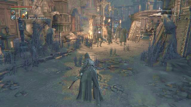 An accurate throw with a Molotov cocktail will allow you to eliminate even an entire group of enemies at once. - Central Yharnam - Walkthrough - Bloodborne - Game Guide and Walkthrough