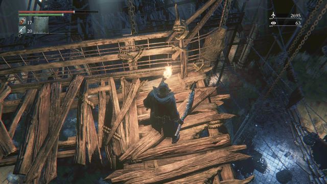 The rope that you can cut to set the opponents below on fire. - Old Yharnam - Walkthrough - Bloodborne - Game Guide and Walkthrough
