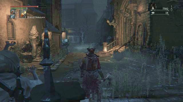 From the right side a beast will jump on you and unlock the entrance to the building. - Old Yharnam - Walkthrough - Bloodborne - Game Guide and Walkthrough