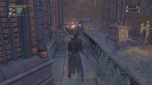 Immediately behind the spot where a shooter stands on a balcony, on the left you will find elevator. - Yahargul, Unseen Village - Yahargul Chapel - Walkthrough - Bloodborne - Game Guide and Walkthrough