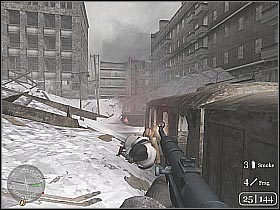 Wait for the other squad members to take appropriate positions (screen 1), mostly behind one of the trucks - Stalingrad City Hall - Fortress Stalingrad - Call of Duty 2 - Game Guide and Walkthrough