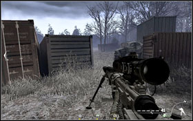 Right by a container in the distance (next to two trees). - Charlie - Hidden - Spec Ops - Call of Duty: Modern Warfare 2 - Game Guide and Walkthrough
