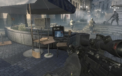Move to the left side of the square, where you will find intel #33 lying on the table - [Act II] Eye of the Storm - Walkthrough - Call of Duty: Modern Warfare 3 - Game Guide and Walkthrough